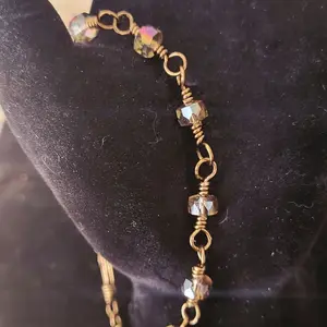 brass wire wrapped bracelet with iridescent beads