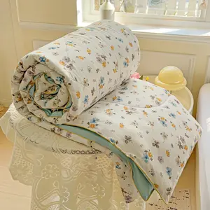 A vintage floral summer quilt—soft, breathable, and lightweight—perfect for use in the bedroom, office, living room, or for general home relaxation during the summer season