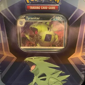 Pokemon Tyranitar Tin - Official Trading Card Game Collectible Container Featuring Tyranitar from the Pokémon Series(live rip)
