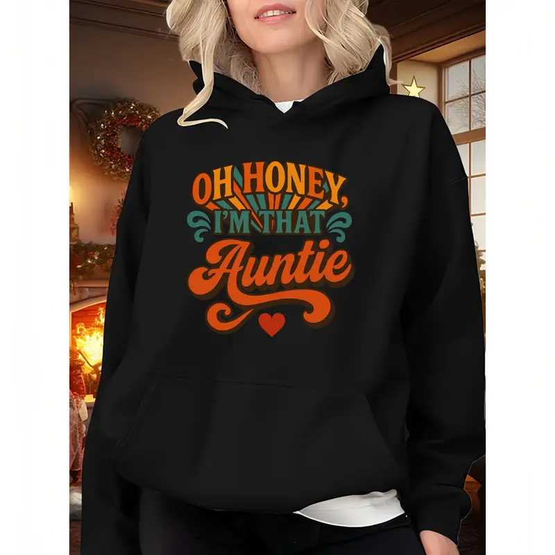 Black Hoodie Featuring Vibrant Orange and Teal 'OH HONEY, I’M THAT Auntie' Lettering and Red Heart Illustration