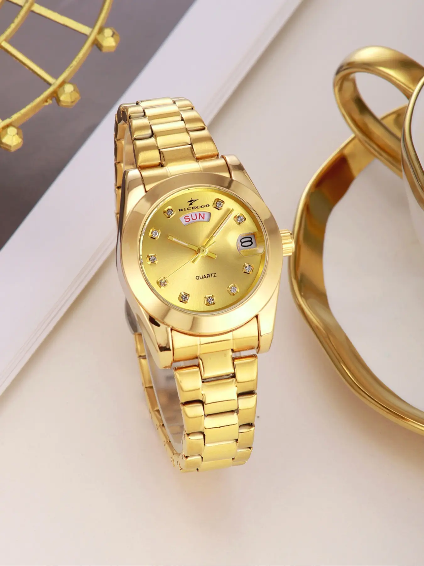 RICECGO women's gold watch, with an elegant round dial, rhinestone design, dual date display, a fashionable and timeless jewelry accessory, comes with