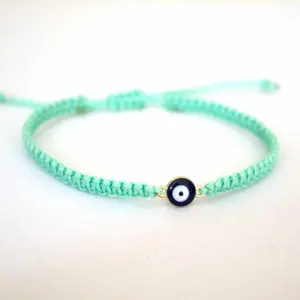Handwoven Festival Macrame Bracelet with Evil Eye Charm - Handcrafted Adjustable Wristband for Everyday Wear
