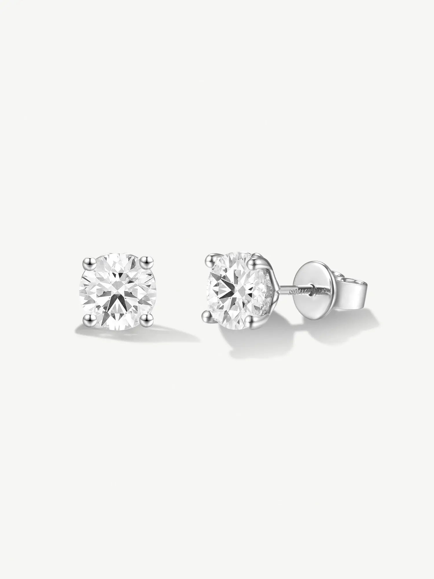 "Essence of Light" Classic Four Prong Lab Grown Diamond Solitaire Stud Earrings in Sterling Silver Fine Jewelry for Women Promise Anniversary Birthday Gifts for Her (0.6-2 Ct. Tw.)