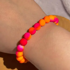 Fluorescent pink and orange beaded bracelet
