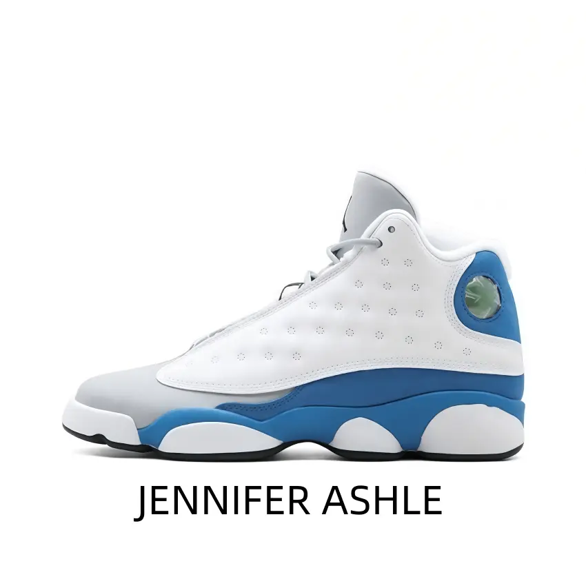 Eye-catching white high-top with blue suede panels, grey toe cap, green logo detail, and a bold basketball silhouette for a unique look.
