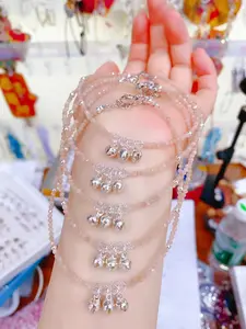 Selected natural crystal, translucent with a soft glow. Whether worn as a bracelet or an anklet, it brightens your complexion and exudes tenderness, making it the perfect accessory for spring vibes.