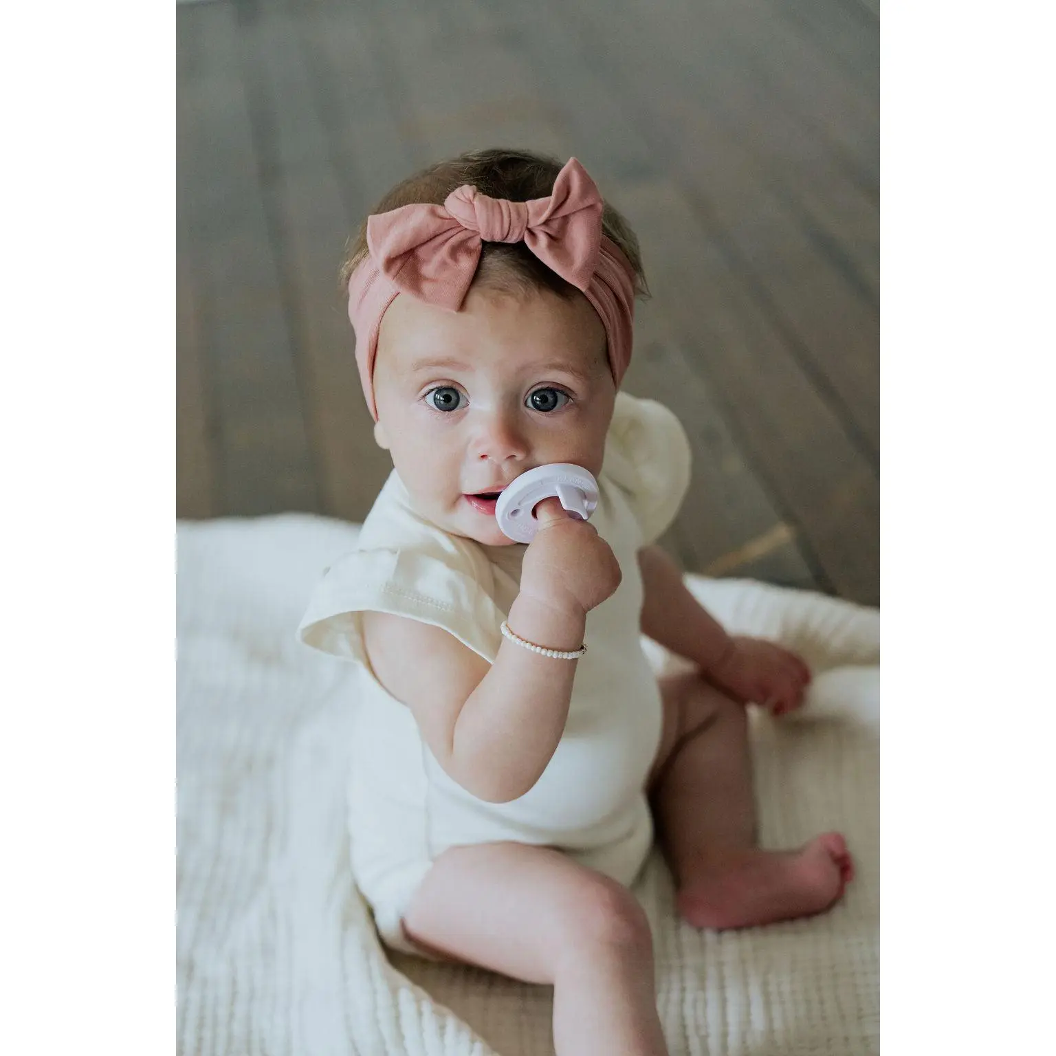Brin Onesie, Buttery Soft 100% Organic Cotton Baby Girl Bodysuit, Flutter Sleeve Snap Bottom Onesie for Newborns & Infants, Sizes Newborn to 12M