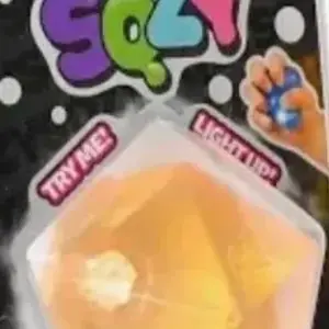 Sqzy light up firm texture stress relief toy colors vary