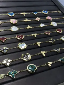 Elegant Titanium Steel Four-Leaf Clover Bracelet for Women, Light Luxury Plated Fashion Accessory, Simple and Stylish Design, Fashionable Jewelry