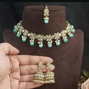 POLKI STYLE Choker in Reverse AD with Jhumka Earrings and Maang Tikka Set for Festive Wear
