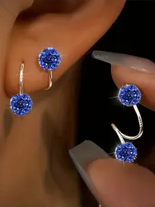 A Pair of Luxurious Double-Headed Screw Earrings with Sparkling Rhinestones, Featuring a Unique S-Shaped Design