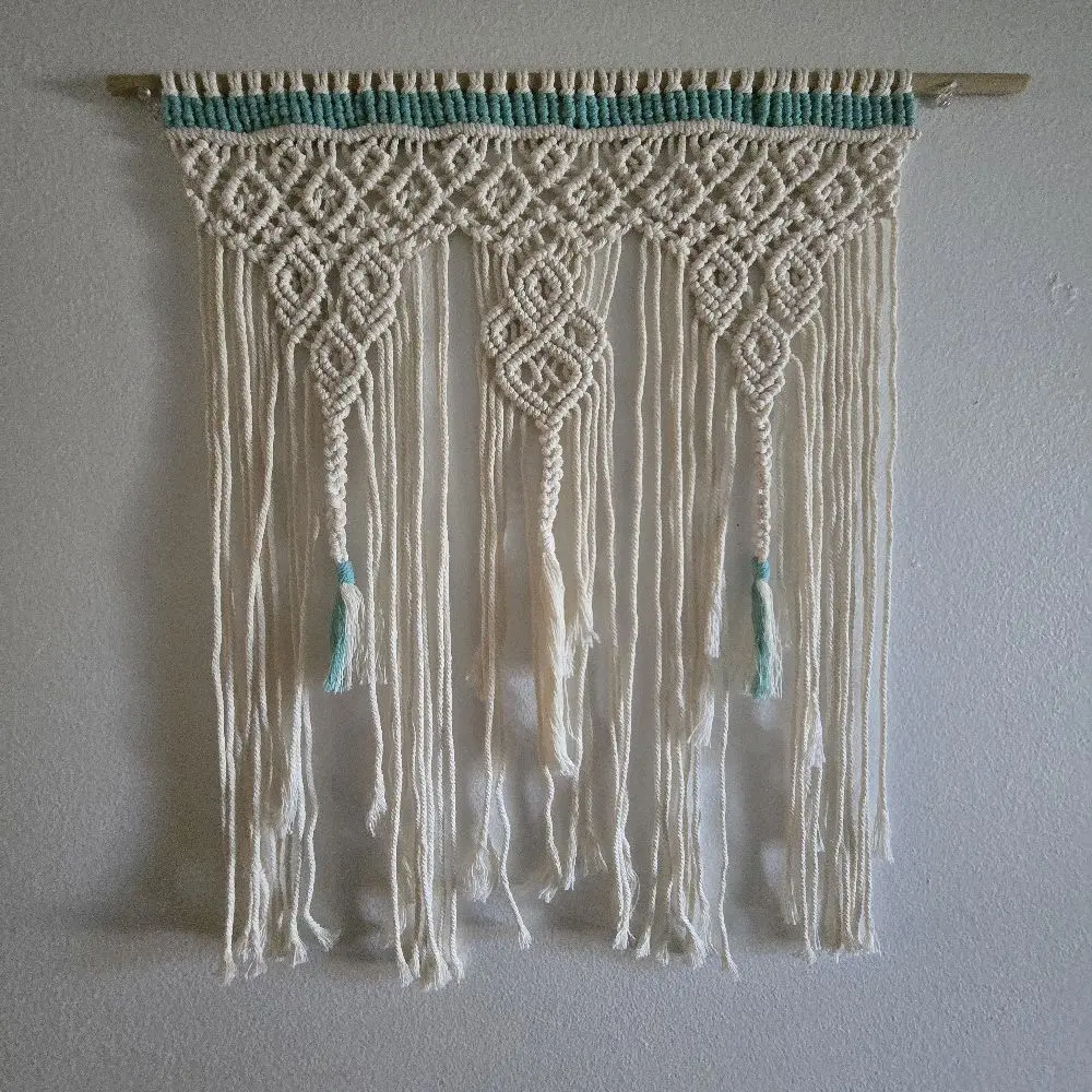 Handmade Macrame Wall Hanging with Teal Accents and Fringe for Boho Decor