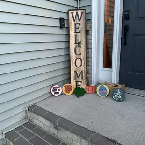Handmade Welcome Sign with interchangeable holiday plaques .