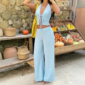 Lazy vacation style set, light blue neck strap-up top with high waist wide-leg pants two-piece set