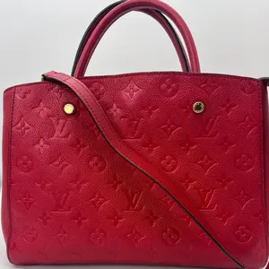 Pre-owned Louis Vuitton empreinte leather Shoulder Bag Montaigne Leather 10.5 Inch & 12 Inch Zip & Clasp Lock Intricate Embossed Design Very Good Condition louis