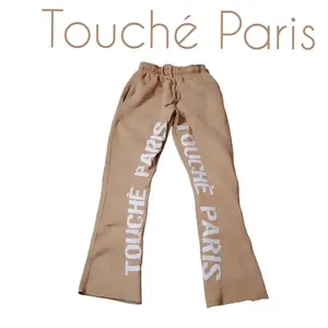 Men Tan Stacked Puff Print Flare Joggers