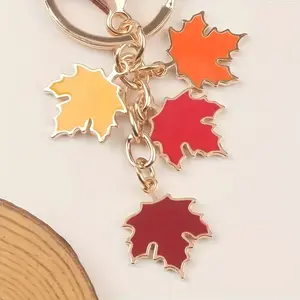 One Colorful Maple Leaf Alloy Keychain - Creative Car Accessories and Earphone Case Decoration, Men's Fashion Key Ring, Non-Galvanized Alloy, Elegant Style, Non-Woven Material