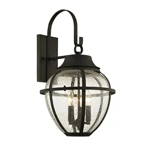 Bunker Hill Large Outdoor Wall Sconce in Vintage Bronze with Clear Seeded Glass