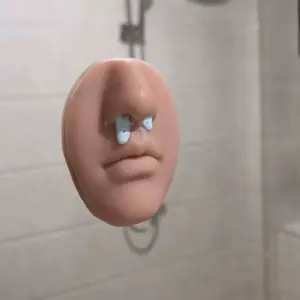 Simulated face model of hand sanitizer for pinching nose