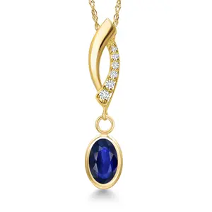 14K Yellow Gold Blue Sapphire and Lab Grown Diamond Pendant Necklace for Women | 0.60 Cttw | Gemstone September Birthstone | Oval 7X5MM | With 18 Inch Chain