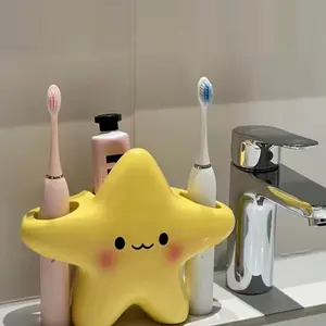 1 Cute star-shaped plastic toothbrush holderIndependent bathroom storage, with a cuteface design,durable plastic structure,space.saving toothbrush and toothpaste holderBathroom Accessory