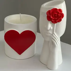 “JOLEN” Candle “Heart” and Vase “Face” set.The candle creates a warm,cozy atmosphere while the Vase adds a stylish touch to your interior-together they form a beautiful and practical set.Natural beauty and coziness.Perfect for your home or gift