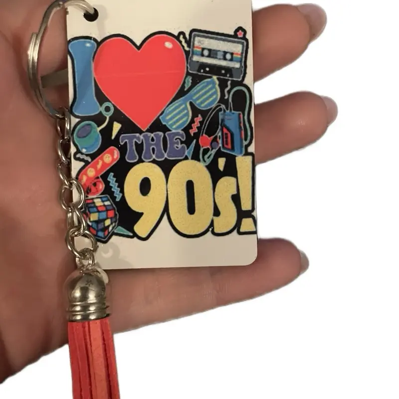 I Love the 90s Keychain - Colorful Design with Heart and "THE 90S" Text, Includes Clip and Red Cord