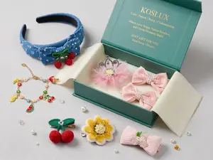 Signature Koslux Gift Box - One Cherry Whispers Bow Headband + One Forest Treasure Bracelet + One Cherry Nibble Clip +  One Sunlit Daisy Clip + One Tiara Bloom Clip + One Garden Whispers Bow Clip +Two Blush Ballet Bow Clips