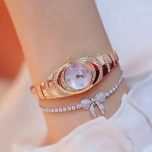 Women’s watch with a simple design featuring a round dial adorned with rhinestones and a gold quartz movement, ideal for everyday wear and as a birthday gift.