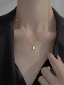 A golden/silver necklace, a rectangular pendant necklace, Minimalist Necklace