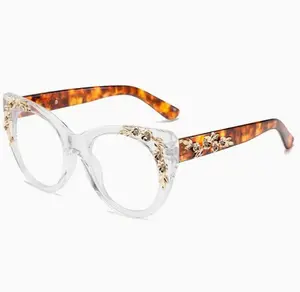 Golden Girl Eyewear - Clear & Tortoise Frames with Gold Metal Flowers for Daring Elegance