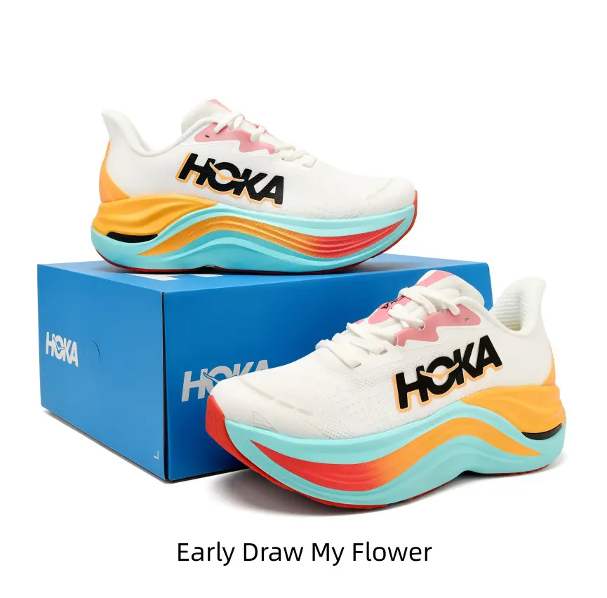 Cream white running shoes with gradient cyan and orange midsole bring bright summer tones to match casual outfits for eye-catching street style photos