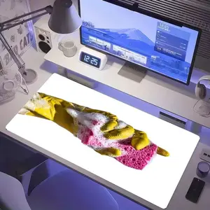 Modern White Desk Setup with Purple Lighting - 12:25 Digital Clock, White Monitor, Gray Desk Lamp, White Mug, Speakers, Fan, Headphones, Black Remote, Purple Cup, Plus Yellow