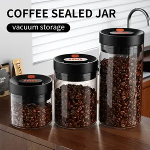 Transparent circular vacuum glass jar with one click exhaust design for coffee, tea, and nut storage. 400/600/1200ml high borosilicate glass jar with vacuum sealed moisture-proof kitchen food storage container