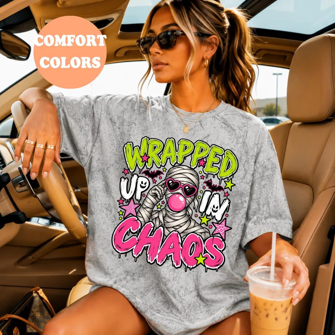 Wrapped Up in Chaos Mummy Comfort Colors T-Shirt | Funny Halloween Tee | Pink Mummy Graphic Shirt | Girly Spooky Season Tee | Halloween Graphic T-Shirt