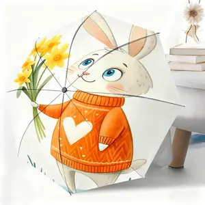 This waterproof folding umbrella features a white rabbit holding a yellow flower and wearing an orange sweater. Suitable for both men and women, it's portable and ideal for travel and everyday use.