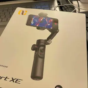 Product Review of Handheld 3 Axis Anti-shake Shooting Stand (1 Count), Rotating Automatic Face Tracking Tripod Stabilizer for Live Video, Phone Accessories, Content Creator Tools from M**e