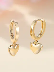 A pair of heart-shaped water drop earrings made of synthetic white crystal, stylish, elegant, and vintage-inspired, suitable for everyday wear by women attending weddings.