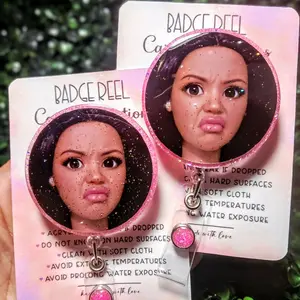 Disgusted Doll Badge Reel   Latina / Asian