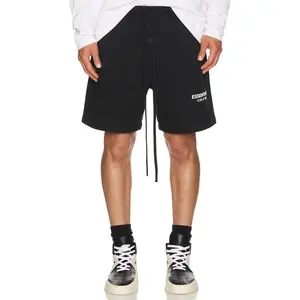 Fear of God ESSENTIALS Soccer Fleece Shorts in Jet Black