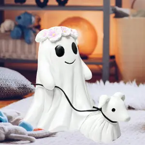 A cute ghost leading a dog decorative item, a creative, exquisite and personalized Halloween home decoration item that combines the bizarre and the cute for Halloween. It is a festival gift for friends and a resin handicraft decoration