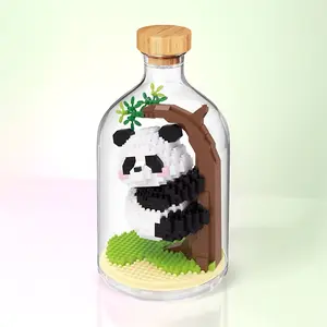 Panda in a Bottle — Micro Block DIY kit: build a panda hugging a tree in a clear dome; perfect gift, ages 14+
