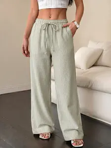 Women’s lightweight striped wide-leg pants—comfortable for home wear with a drapey feel, elastic waistband with drawstring, versatile striped long pants suitable for casual, beach, and vacation outfits; an essential piece for summer.