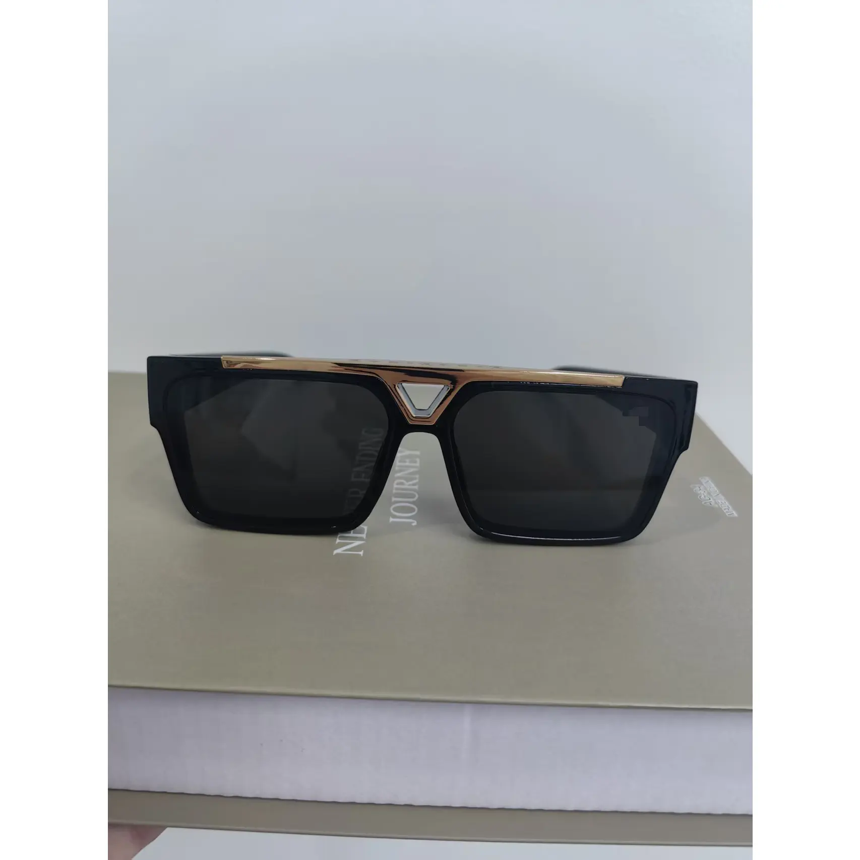 Luxury Black Sunglasses with Gold Accents and Dark Lenses for Men