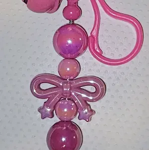 Beautiful Pink Keychain or purse Clip with Bell Featuring Bow Design and Beaded Accents for Stylish Accessory