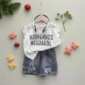 A Stylish And Trendy Sleeveless Letter Outfit for Boys, Paired with Ripped Faux Denim Shorts, Perfect for Summer, Featuring a Two-Piece Hip-Hop Style for Kids, for Outdoor