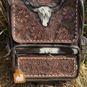 Dark Brown Tooled Leather Longhorn Backpack with Intricate Floral Design and Cowhide Accents