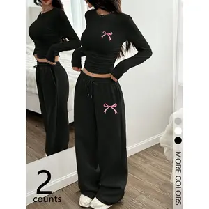 Women’s two-piece set featuring a bowknot print regular-fit round-neck T-shirt and pants; casual suit outfit for fall and winter; women’s long-sleeve suit for daily wear