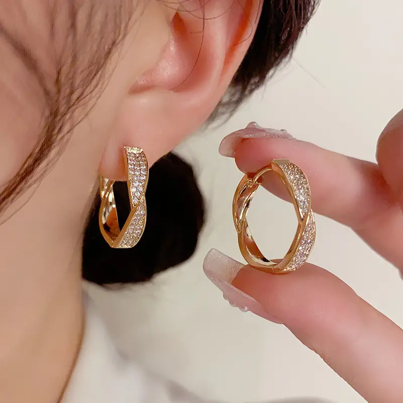 Unique and stylish micro-inlaid twisted hoop earrings DDES0454, high-end minimalist niche design earrings, 14K gold-plated