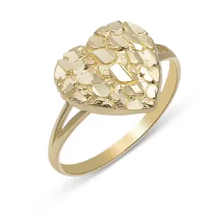woman’s golden heart nugget ring